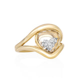 Cascavel Heart-ish Ring Petite by Moritz Glik in 18k yellow gold with 0.32ct diamonds enclosed in rounded-triangle-shaped Kaleidoscope Shaker on white background, facing right