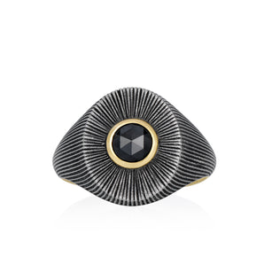 Men's Ponto Signet Ring Black Diamond. Ring will textured, blackened silver, and 18k gold surrounding a centered black diamond. Facing forward