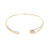 The Cascavel Choker Necklace Petite by Moritz Glik with 1.16ct of diamonds set and enclosed in a Kaleidoscope Shaker™ in 18k gold. Featuring a diamond-filled, oval Kaleidoscope Shaker™ on one side, counterbalanced by seven bezel-set round and oval diamonds, all set in an open-front, asymmetrical frame.