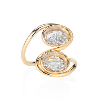 The Oito Ring by Moritz Glik with 1.0ct of diamonds enclosed in two parallel, oval Kaleidoscope Shakers™  held in a looping, continuous 18k gold band. Invoking the shape of an eight. 