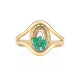 Cascavel Oval Ring Petite Emerald by Moritz Glik in 18k yellow gold with 0.23ct of emeralds enclosed in an oval-shaped Kaleidoscope Shaker on white background, facing front